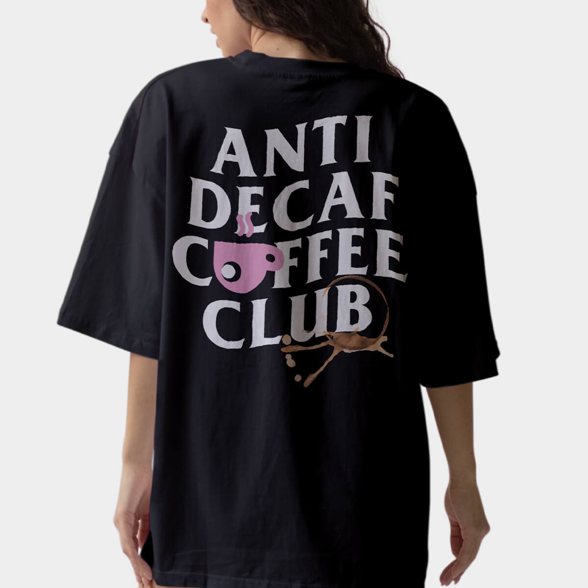 Black Anti Decaf Coffee Club unisex shirt with bold back print and clean front chest logo on model - back view