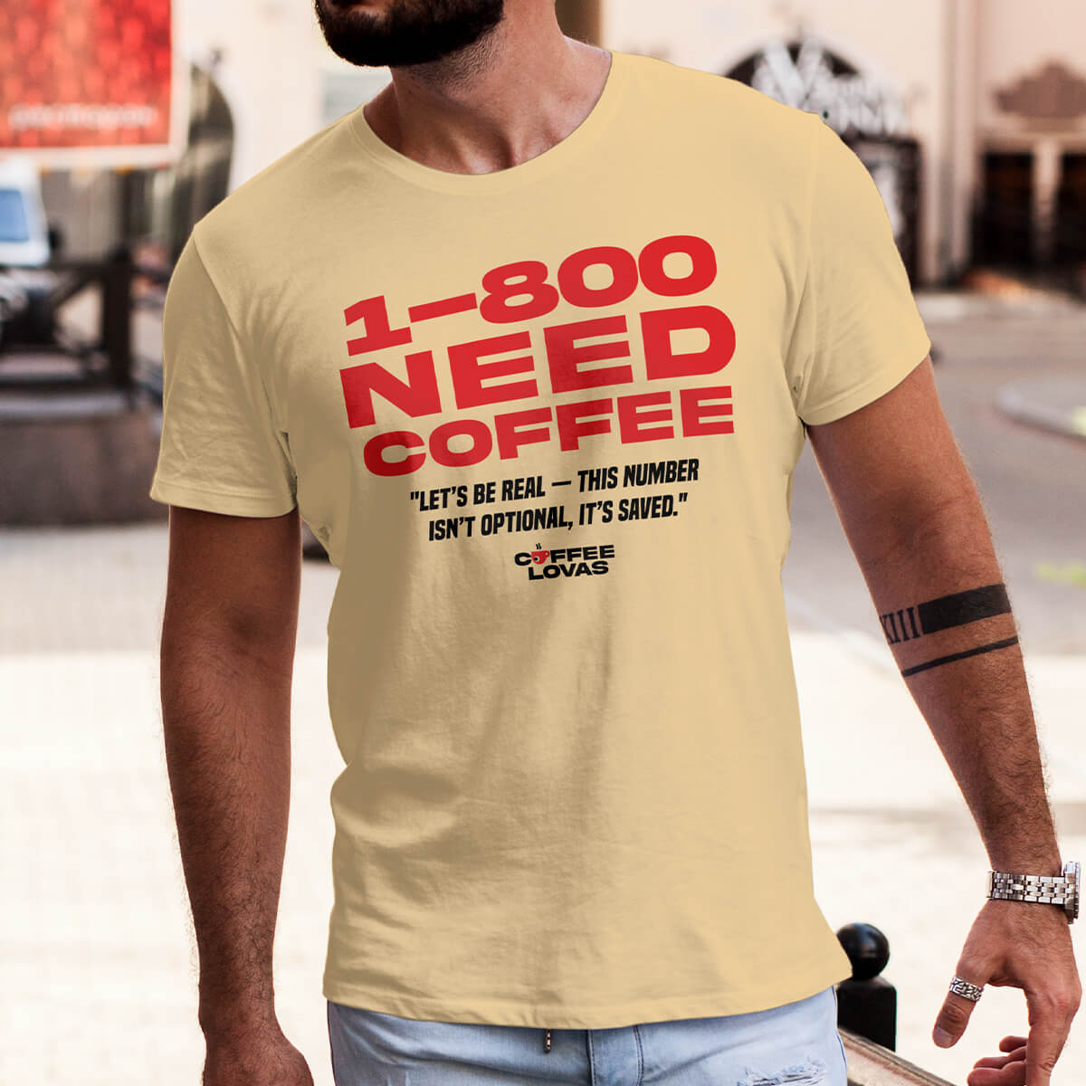Yellow Haze Coffee Hotline Tee with Bold 1-800 NEED COFFEE Funny Coffee graphic for caffeine lovers with speed dial priorities on model