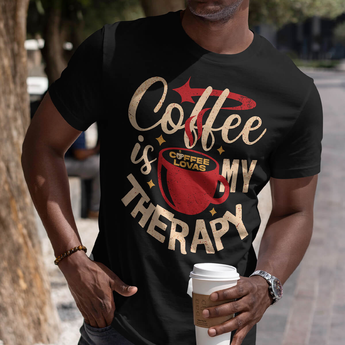 Black Coffee Is My Therapy tee with red mug and swirling steam graphic on model - front view